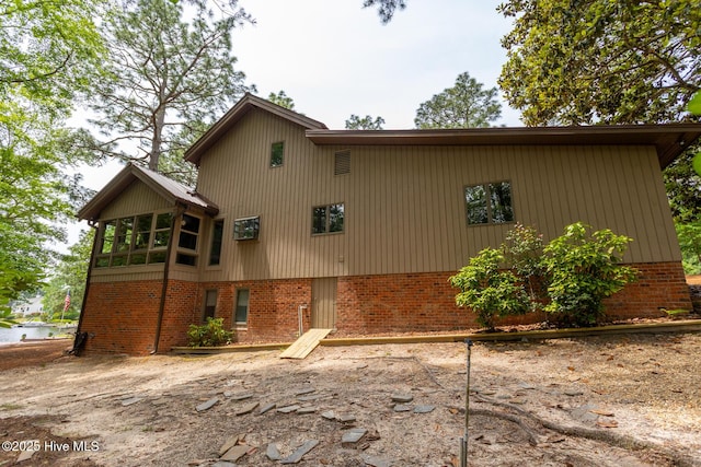 105 Tucker Ct, West End, NC 27376 - rear view of house with brick siding