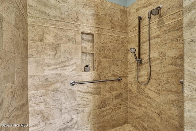 room details with a tile shower