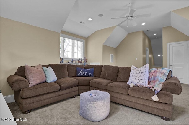 living room with visible vents, ceiling fan, lofted ceiling, and carpet