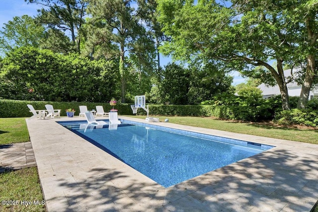 outdoor pool featuring a patio