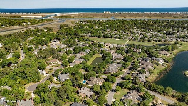 bird's eye view featuring a water view and a residential view