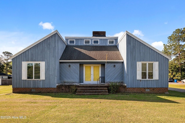 view of front of house featuring crawl space, a chimney, a front lawn, french doors, and roof with shingles