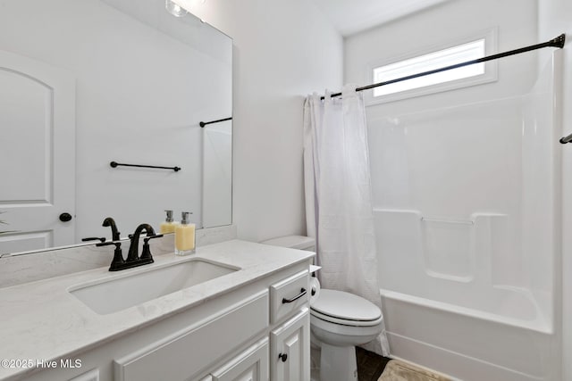 bathroom with vanity, shower / bathtub combination with curtain, and toilet