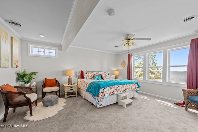 bedroom with baseboards, crown molding, and visible vents