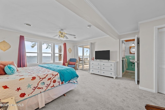 bedroom with carpet flooring, visible vents, crown molding, and access to outside