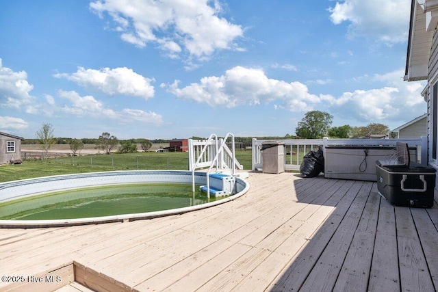 outdoor pool featuring a wooden deck
