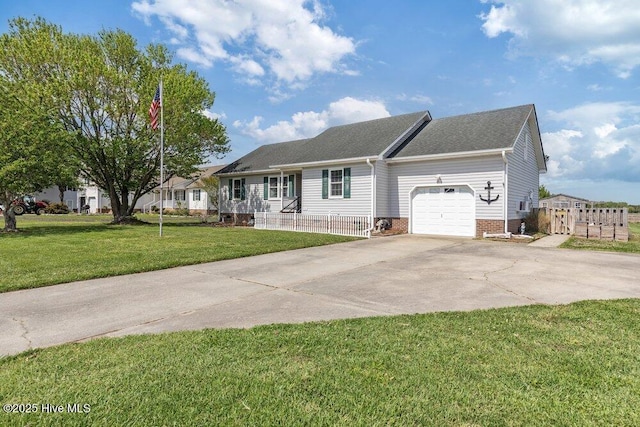 single story home with fence, concrete driveway, roof with shingles, a front yard, and a garage