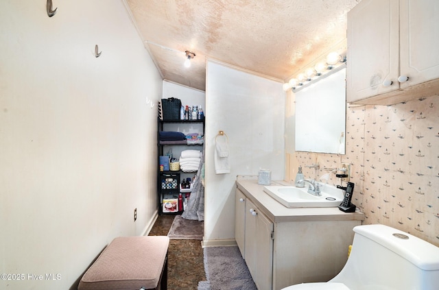 302 N Saratoga St, Stantonsburg, NC 27883 - half bath featuring vaulted ceiling, toilet, vanity, baseboards, and a textured ceiling