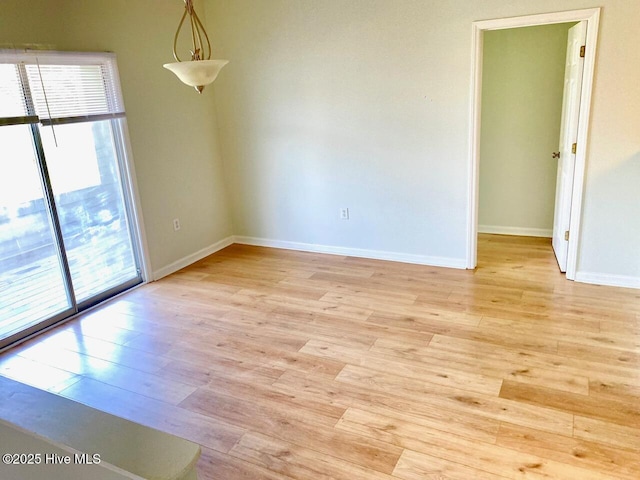 4105 Breezwood Dr Unit 203, Wilmington, NC 28412 - empty room with light wood-style floors and baseboards