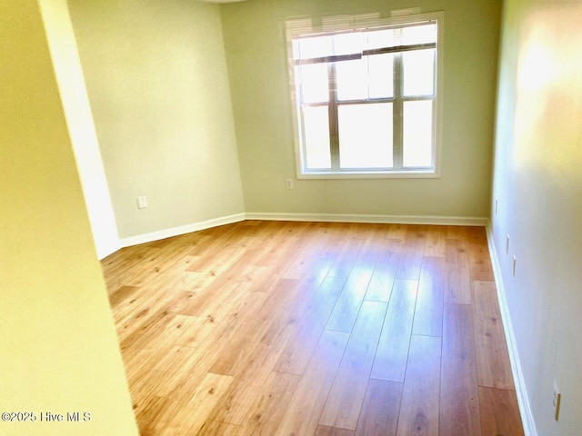 4105 Breezwood Dr Unit 203, Wilmington, NC 28412 - spare room featuring hardwood / wood-style floors and baseboards