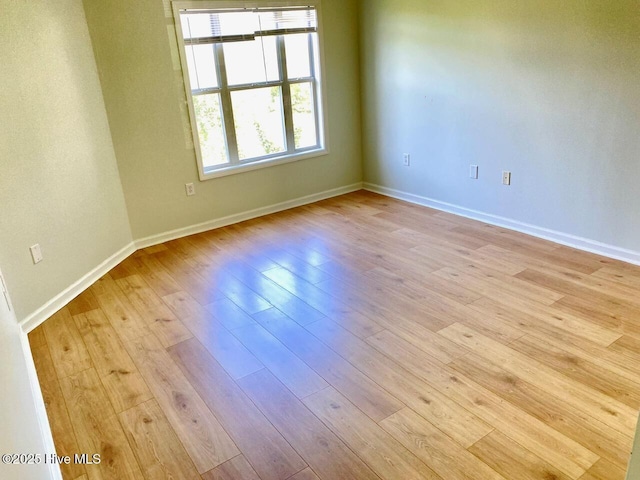 4105 Breezwood Dr Unit 203, Wilmington, NC 28412 - empty room with light wood-style floors and baseboards