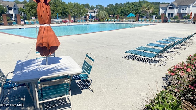 4105 Breezwood Dr Unit 203, Wilmington, NC 28412 - community pool with a patio area