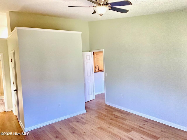 4105 Breezwood Dr Unit 203, Wilmington, NC 28412 - unfurnished bedroom with light wood-type flooring, baseboards, and ceiling fan