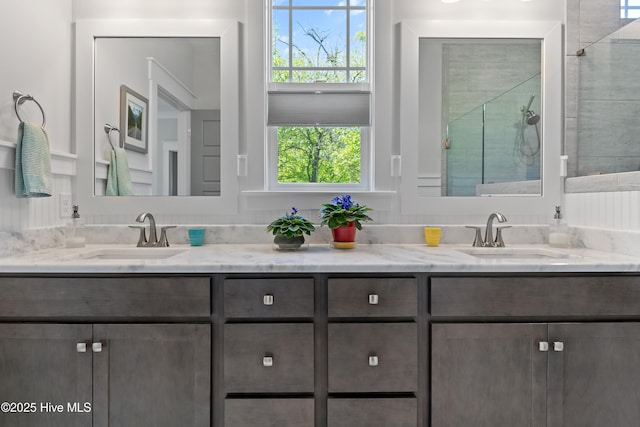 3981 Bay Colony Rd NE, Leland, NC 28451 - full bathroom with a stall shower and double vanity