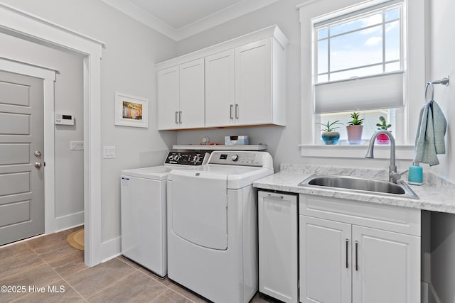 3981 Bay Colony Rd NE, Leland, NC 28451 - laundry room featuring washer and clothes dryer, cabinet space, and ornamental molding