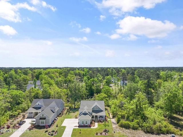 3981 Bay Colony Rd NE, Leland, NC 28451 - view from above of property with a heavily wooded area