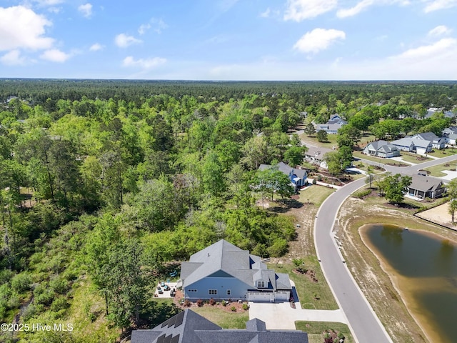 3981 Bay Colony Rd NE, Leland, NC 28451 - aerial view of residential area featuring a forest and a nearby body of water