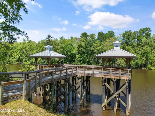 3981 Bay Colony Rd NE, Leland, NC 28451 - dock area featuring a gazebo, a water view, and view of wooded area