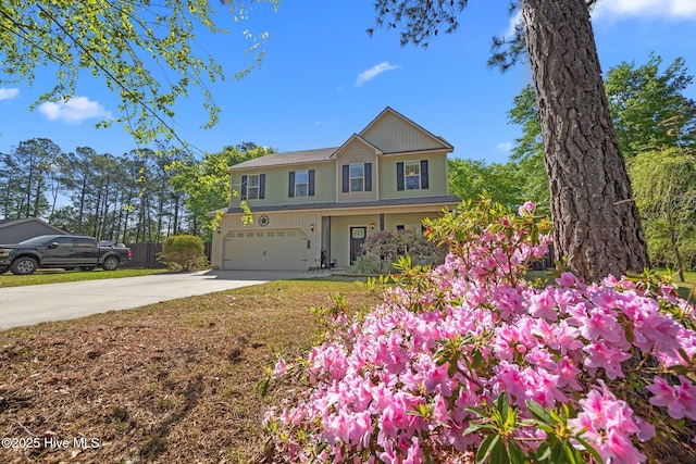 259 Luther Banks Rd, Richlands, NC 28574 - view of front of home featuring an attached garage, driveway, and a porch