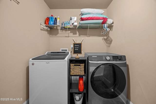 259 Luther Banks Rd, Richlands, NC 28574 - clothes washing area with baseboards, independent washer and dryer, and laundry area