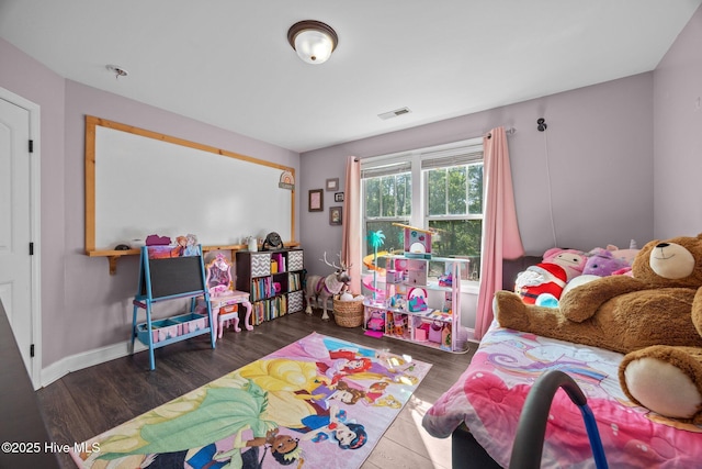 259 Luther Banks Rd, Richlands, NC 28574 - game room featuring baseboards, wood finished floors, and visible vents