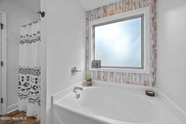 259 Luther Banks Rd, Richlands, NC 28574 - bathroom featuring a bath and a shower with curtain
