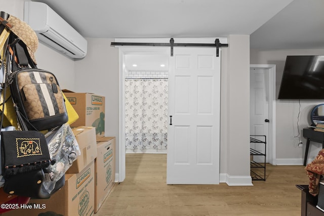 storage area featuring a wall mounted air conditioner