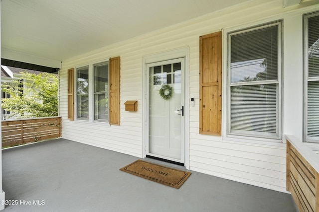 entrance to property with a porch