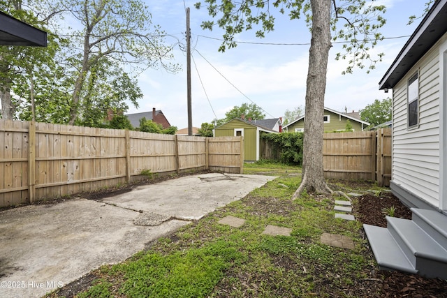 view of yard featuring a fenced backyard and a patio area