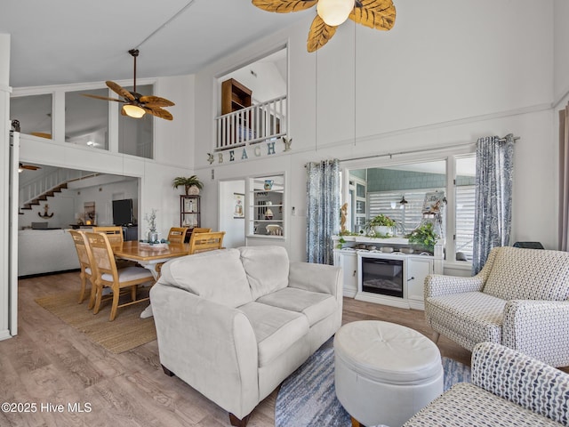267 Live Oak Rd, Newport, NC 28570 - living room with a ceiling fan, a towering ceiling, and light wood-type flooring