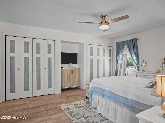 267 Live Oak Rd, Newport, NC 28570 - bedroom featuring multiple closets, wood finished floors, and ceiling fan