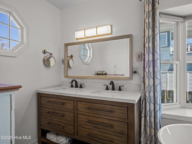 267 Live Oak Rd, Newport, NC 28570 - bathroom featuring double vanity and a soaking tub