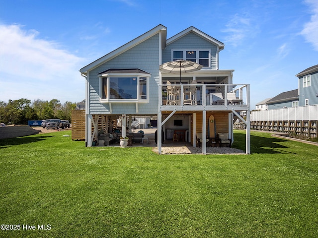 267 Live Oak Rd, Newport, NC 28570 - rear view of property featuring a patio area, a lawn, an outdoor hangout area, and a deck