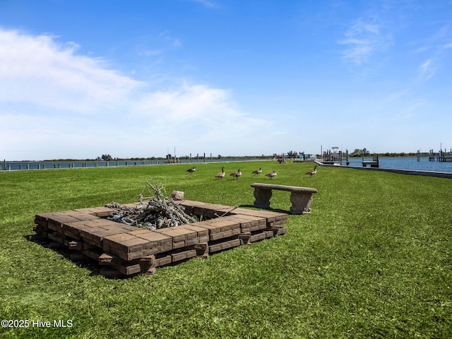 267 Live Oak Rd, Newport, NC 28570 - view of grassy yard featuring a fire pit and a water view