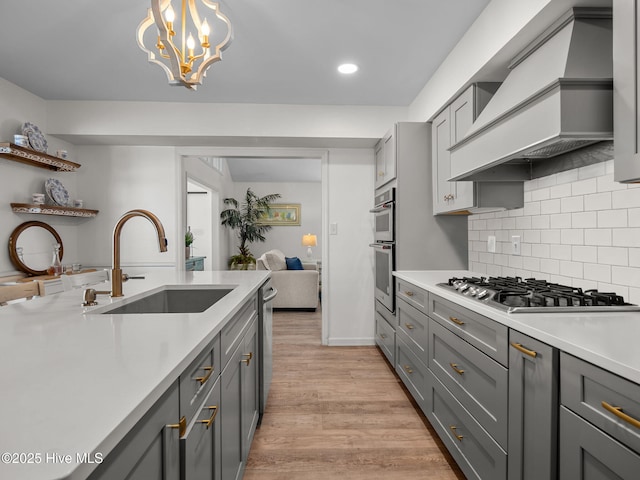 267 Live Oak Rd, Newport, NC 28570 - kitchen with a sink, appliances with stainless steel finishes, custom range hood, gray cabinets, and recessed lighting
