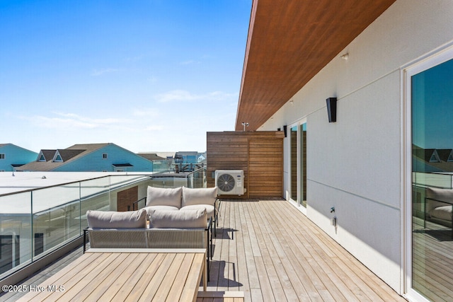 wooden terrace with a cooling unit