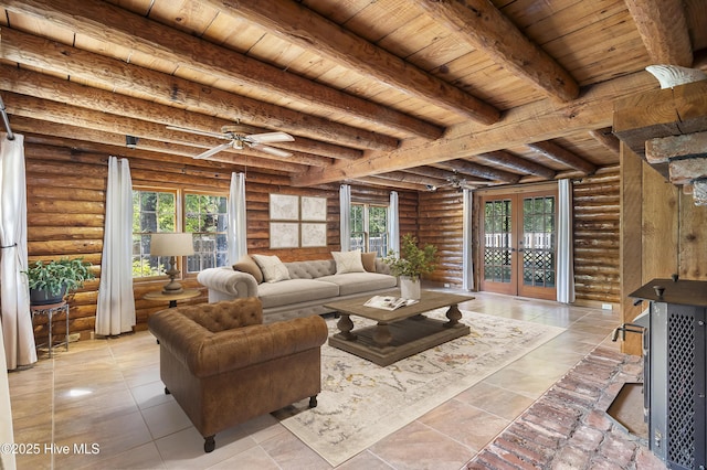 living room with wood ceiling, rustic walls, a healthy amount of sunlight, and french doors