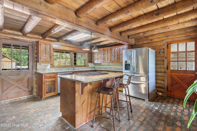 kitchen with brown cabinets, glass insert cabinets, wood ceiling, stainless steel appliances, and a kitchen island