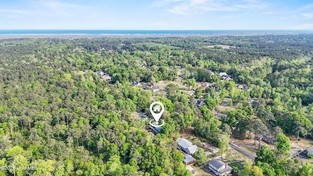 aerial view featuring a view of trees