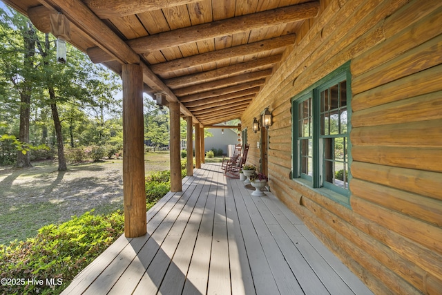 wooden terrace with covered porch