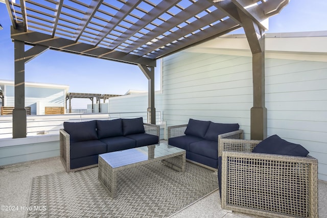 view of patio featuring a pergola and an outdoor living space