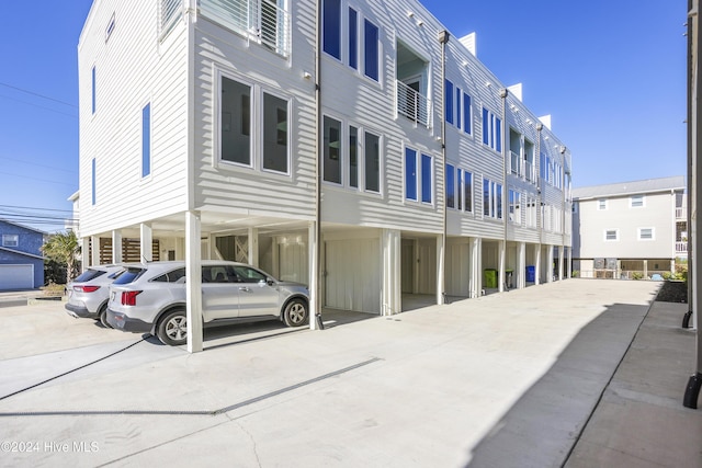 view of building exterior with a carport