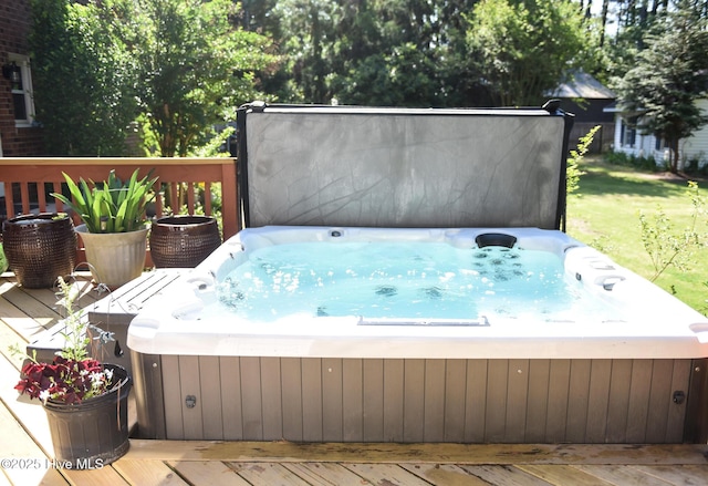 deck with a hot tub