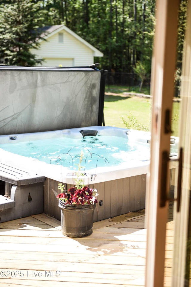 exterior space featuring a hot tub