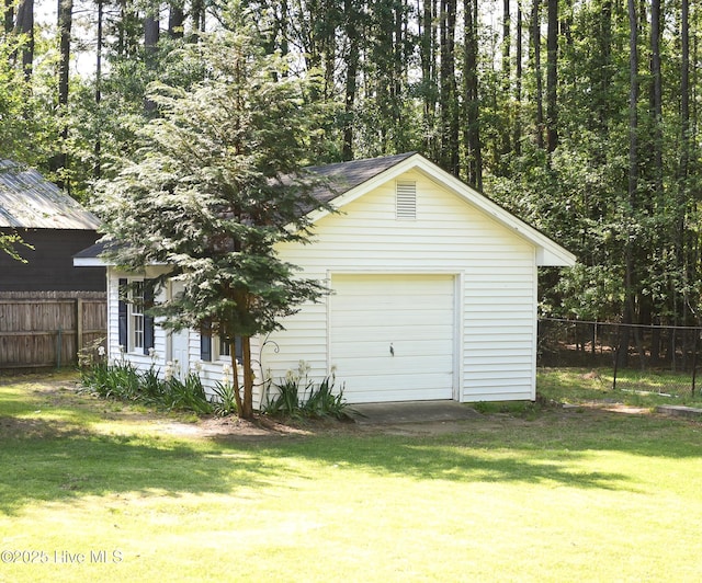 detached garage with fence