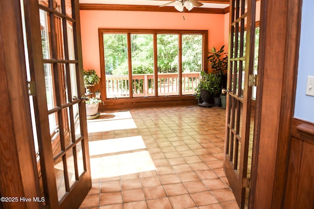 unfurnished sunroom with french doors