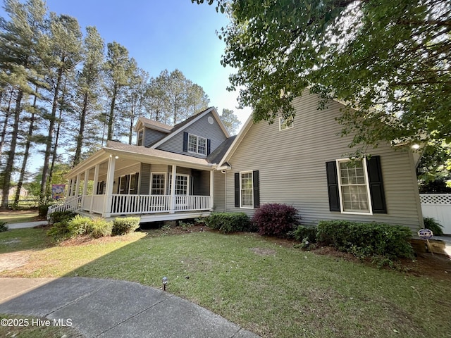 view of front facade with a porch and a front yard