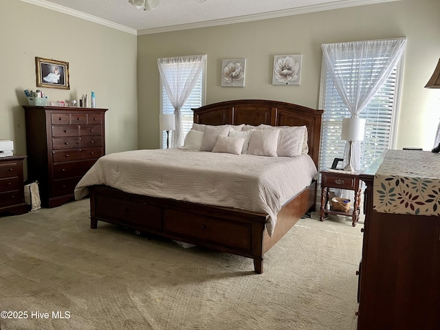 bedroom featuring multiple windows, ornamental molding, and light carpet