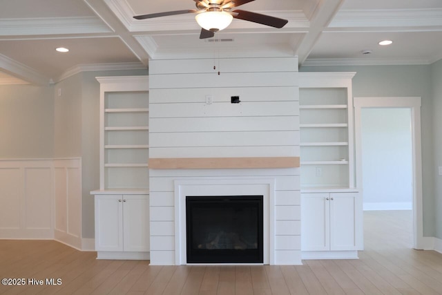3347 Island Lakes Dr, Oak Island, NC 28461 - details featuring wood finished floors, beam ceiling, ceiling fan, and coffered ceiling