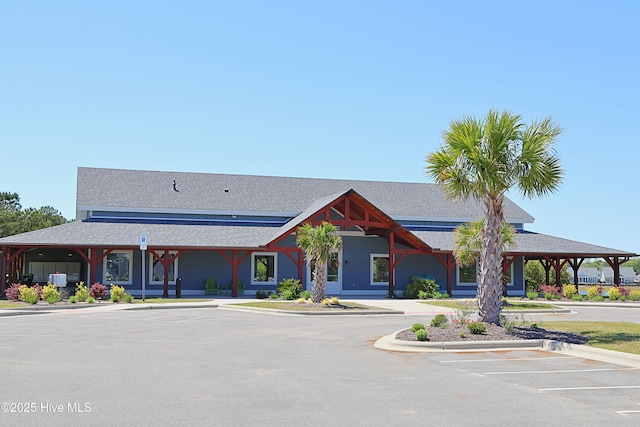 3347 Island Lakes Dr, Oak Island, NC 28461 - view of property featuring uncovered parking